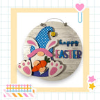 a happy easter sign with a bunny holding a carrot