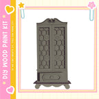 a wooden cabinet with a decorative design on its front.