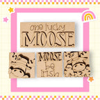 a set of three wooden stamps with words on them