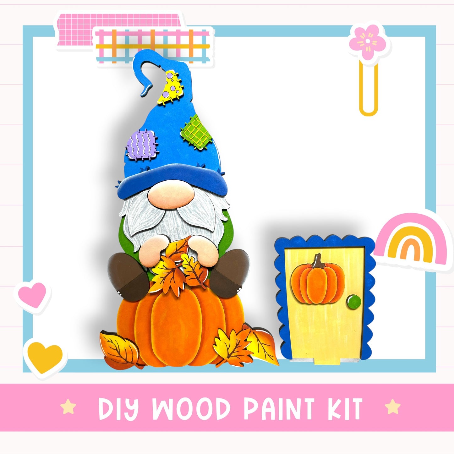 A DIY wood paint kit featuring a gnome holding a pumpkin and surrounded by autumn leaves, with a rainbow and a flower in the background.