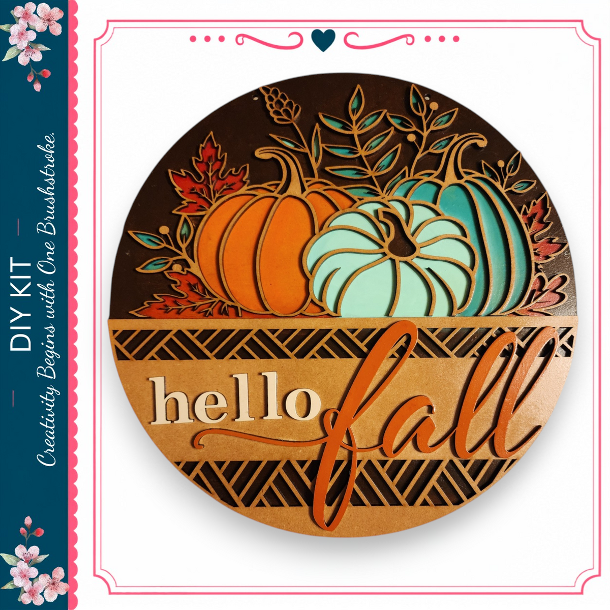 The image is a circular sign with a decorative border, featuring a design of pumpkins and leaves. The sign has the text "Hello fall" written on it.