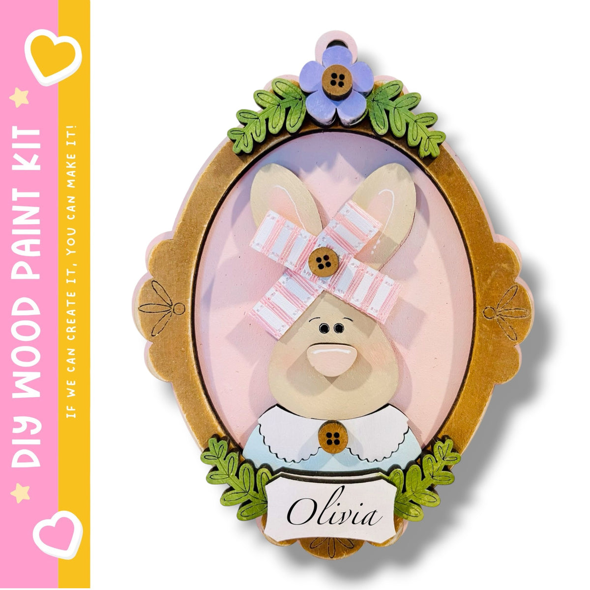 a wooden frame with a cartoon rabbit wearing a pink bow and a white collar, surrounded by green leaves and a purple flower.