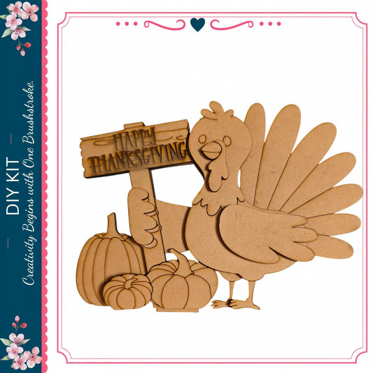 A wooden turkey holding a sign that says "Happy Thanksgiving" is surrounded by pumpkins and a heart.