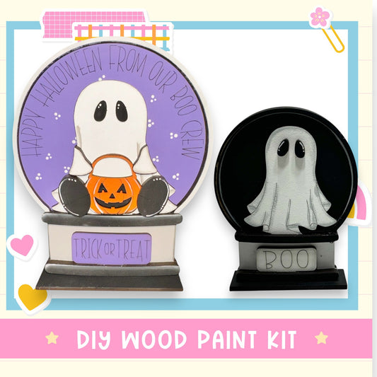 a DIY wood paint kit for creating Halloween decorations, including a wooden ghost and a wooden trick or treat sign.