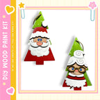 two Christmas tree ornaments, one depicting Santa Claus and the other featuring a woman with glasses, both set against a white background.
