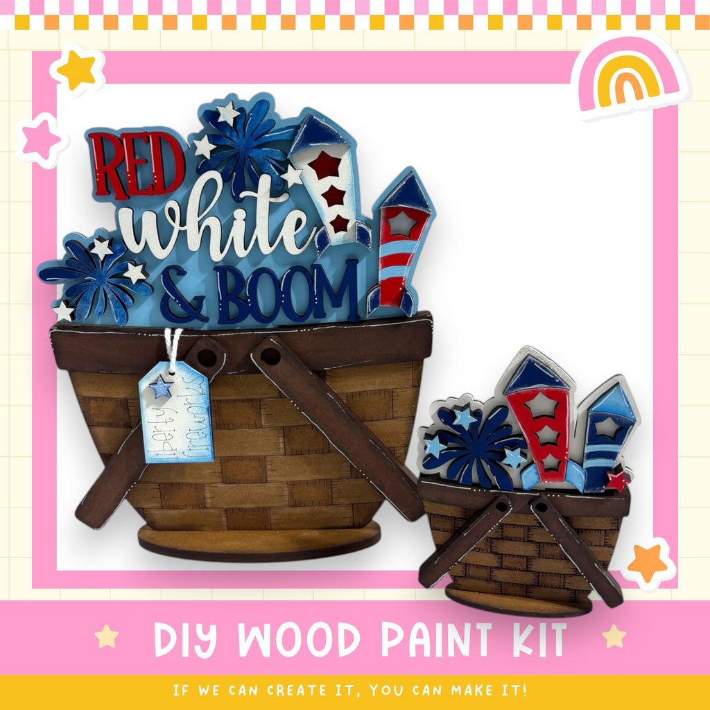 two wooden baskets filled with colorful fireworks, along with a sign that reads "DIY WOOD PAINT KIT" and a rainbow-colored rainbow icon.
