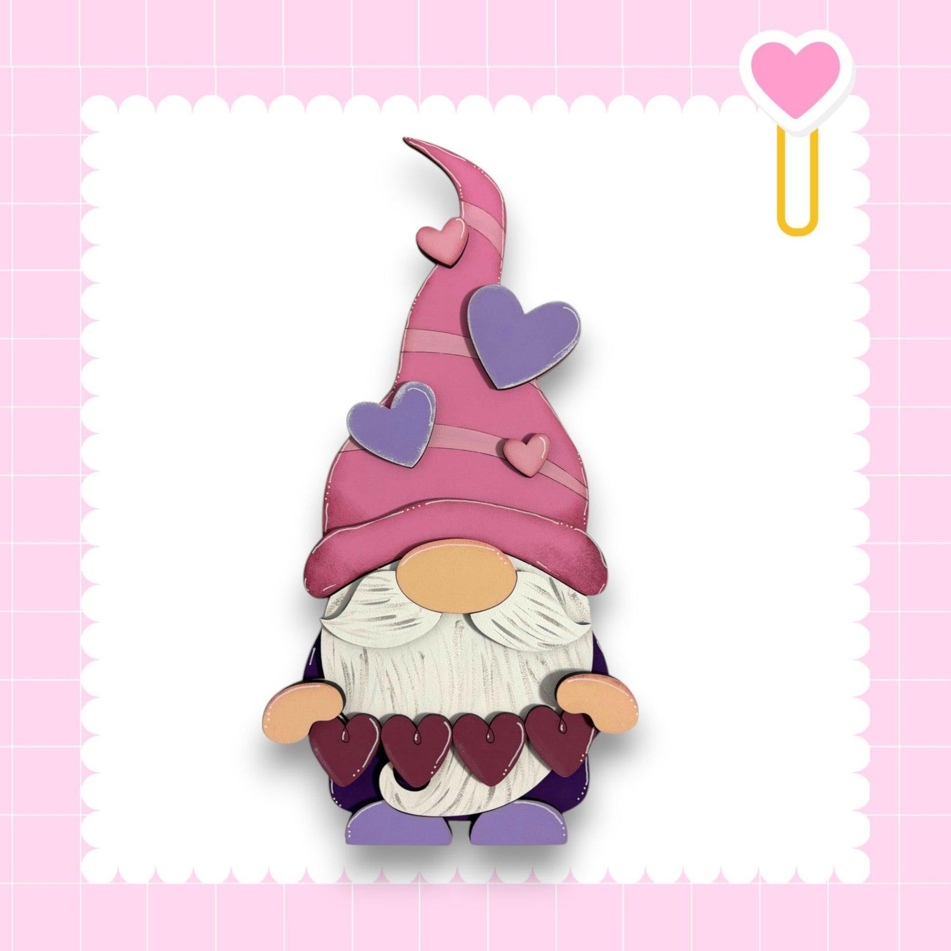 a paper cut out of a gnome with hearts