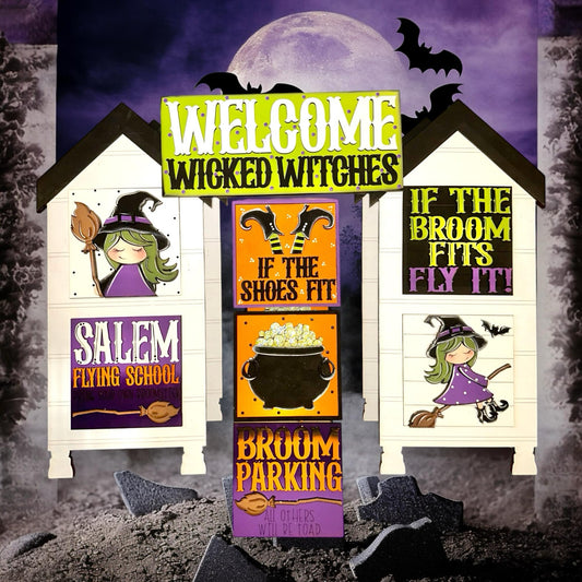 a sign that says welcome to the witches