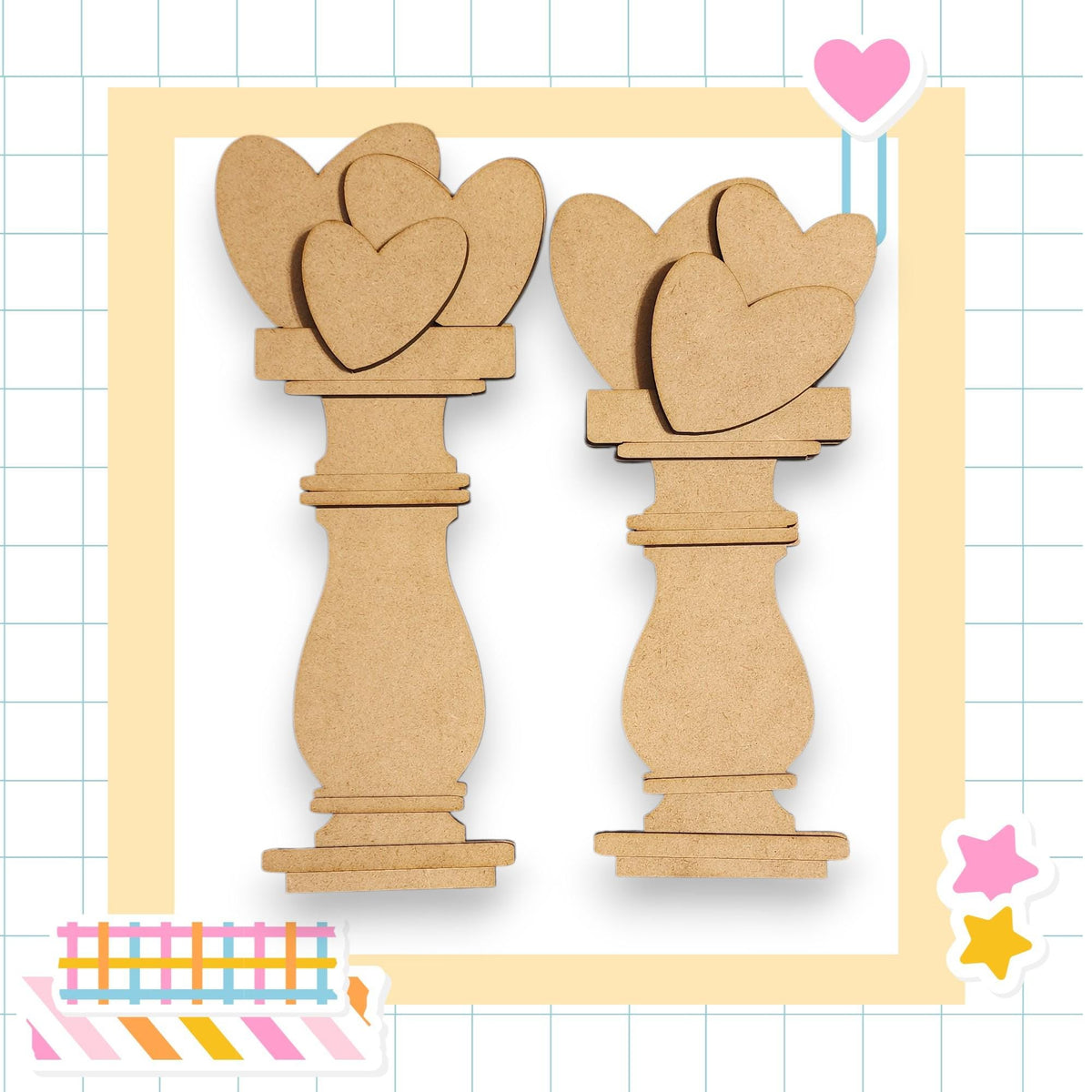 two wooden heart-shaped objects, possibly made of cardboard or a similar material, arranged in a square frame.