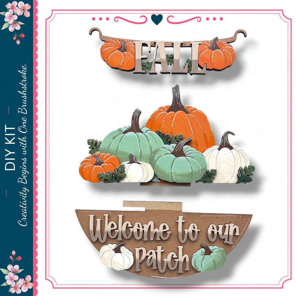 a collection of fall-themed elements, including pumpkins, leaves, and a wooden sign. The pumpkins are of various sizes and colors, and the leaves are scattered around them. The wooden sign reads "Welcome to our Patch".
