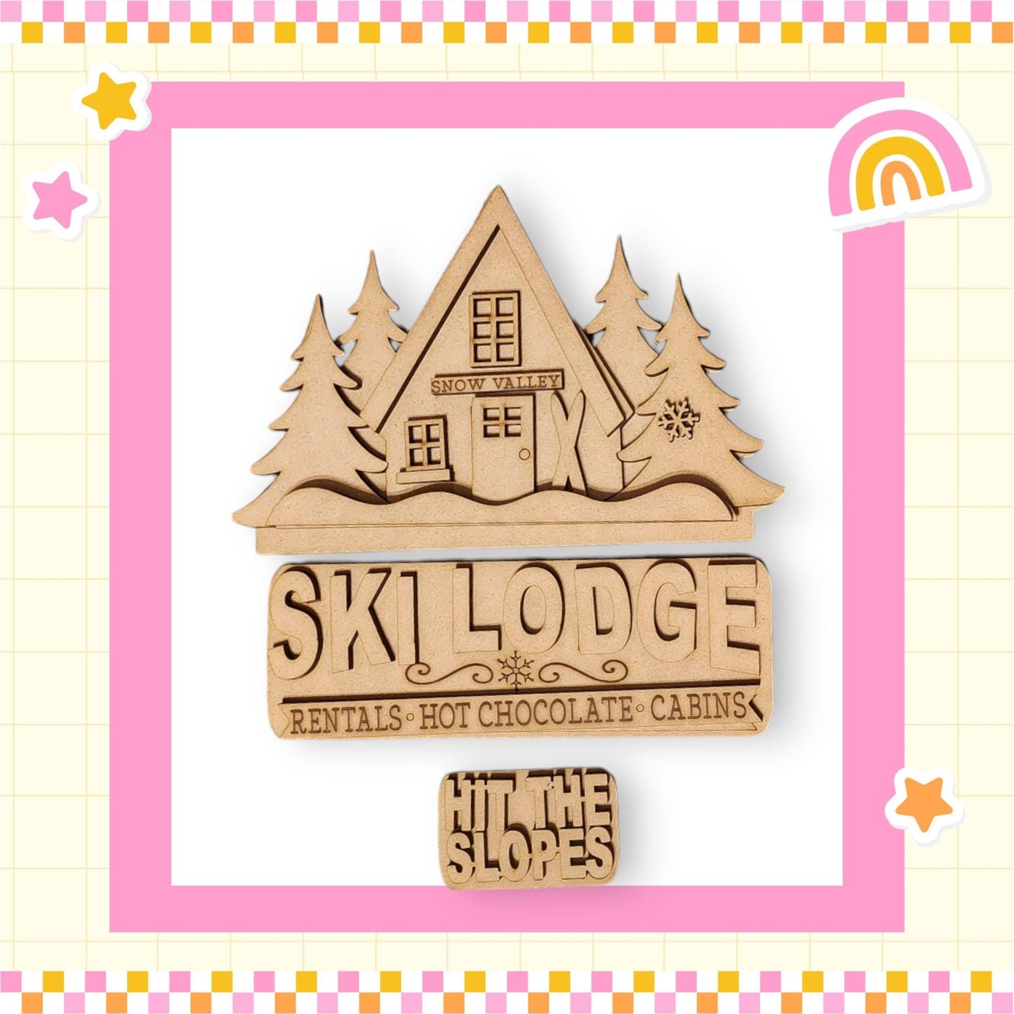 a wooden brooch with a picture of a house