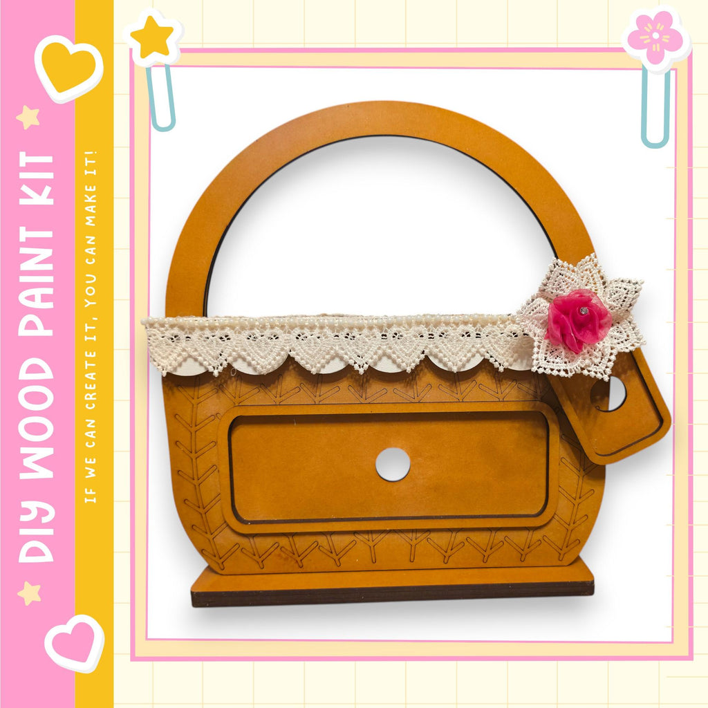 a wooden basket with a lace trim and a pink flower on the side, set against a pink and yellow background with decorative elements.
