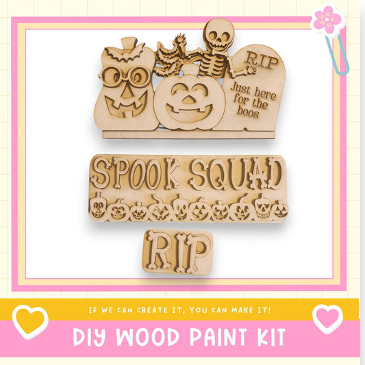 The image is a promotional poster for a DIY wood paint kit, featuring a skeleton, jack-o-lantern, and tombstone decoration.