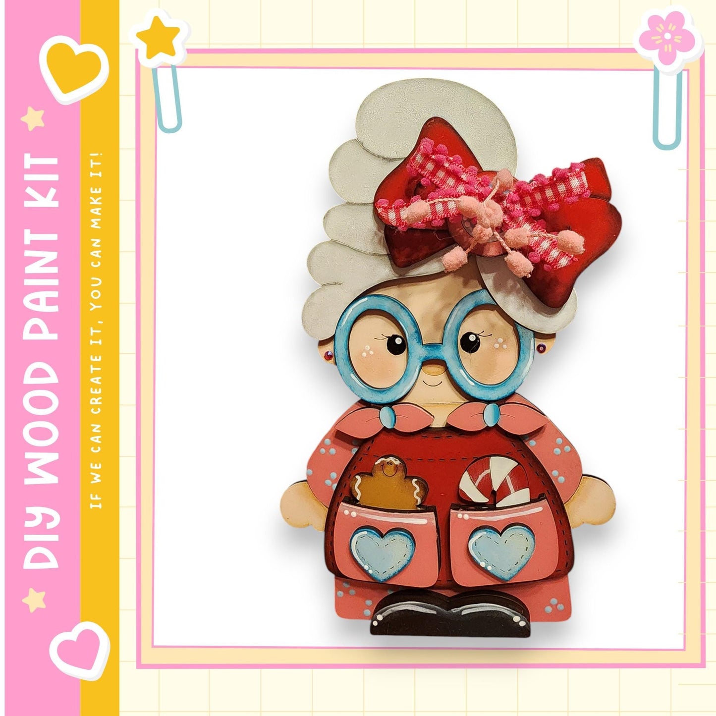 A wooden doll with a red dress, large blue eyes, and a pink bow on her head, standing against a white background.