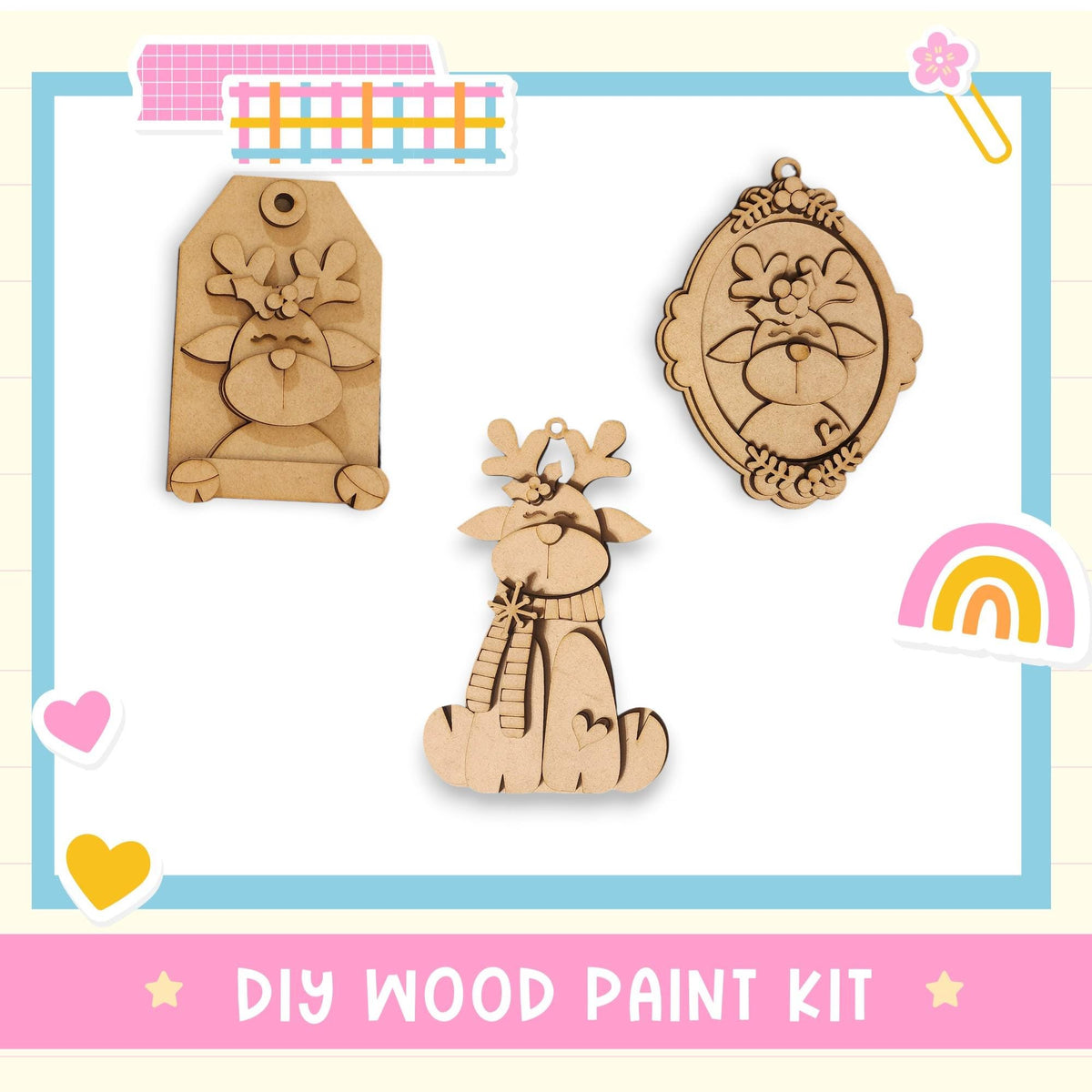 The image is a DIY wood paint kit featuring three wooden ornaments, including a deer, a heart, and a rainbow.