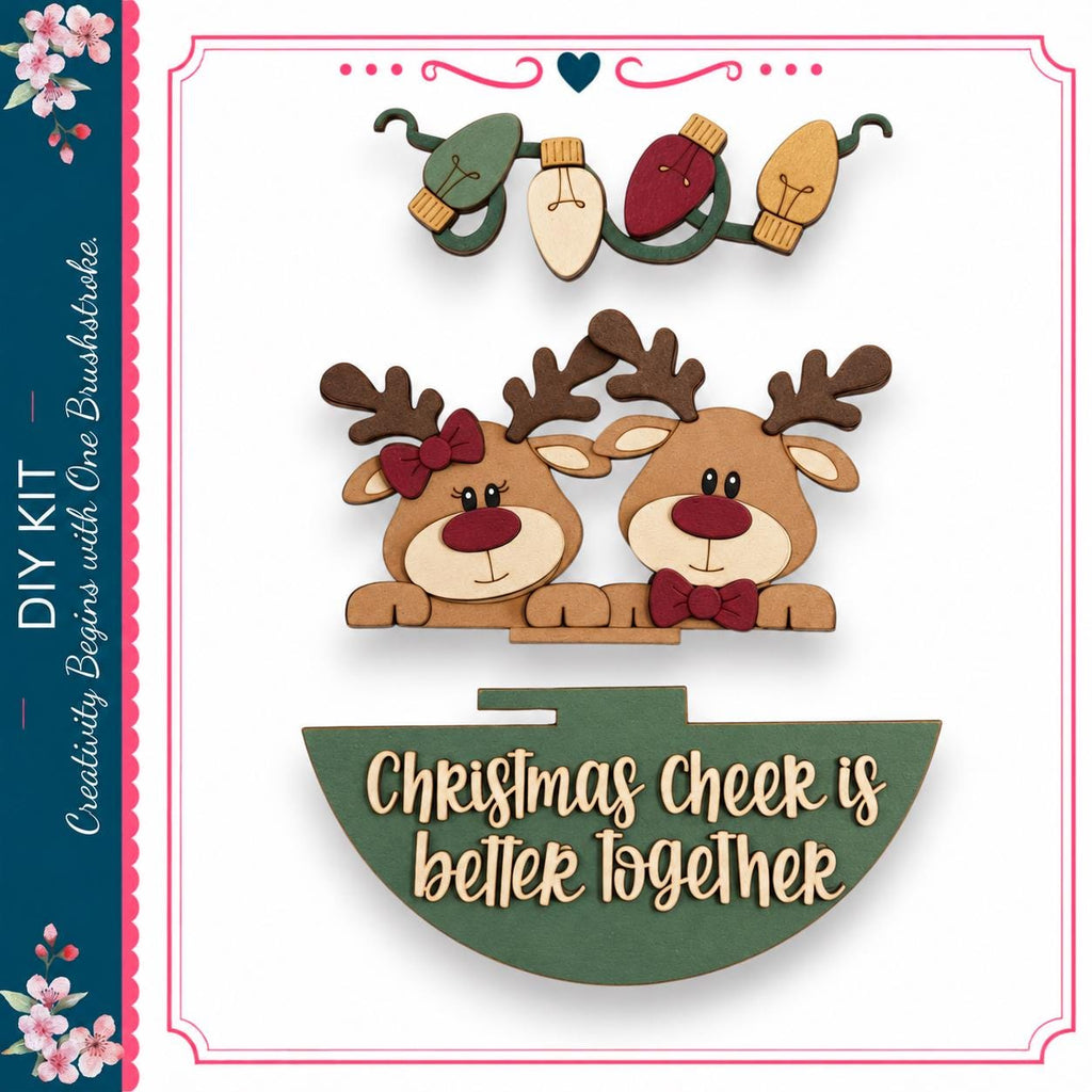 a festive scene with two wooden reindeer wearing bows, surrounded by Christmas lights and a green sign that reads "Christmas Cheek is better together".