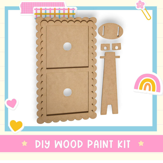 a cardboard cutout of a wooden door and a rainbow