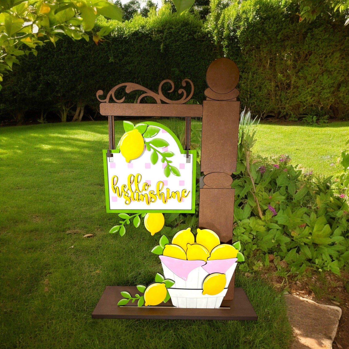 a sign with a basket of lemons on top of it