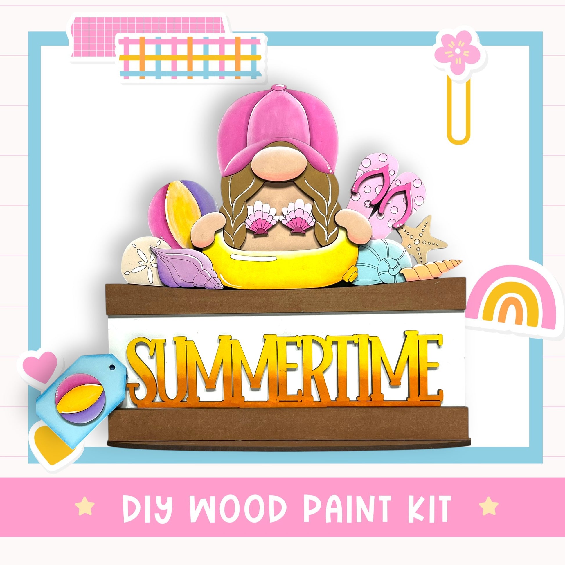 The image is a colorful and whimsical illustration featuring a gnome-like character surrounded by various summer-themed objects, such as a beach ball, flip flops, and a rainbow. The text "DIY WOOD PAINT KIT" is prominently displayed, indicating that this is a DIY wood paint kit for creating a summer-themed artwork.