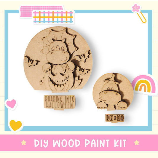 a DIY wood paint kit for creating Halloween-themed decorations, including a wooden cutout of a dinosaur and a smaller wooden cutout of a dinosaur.