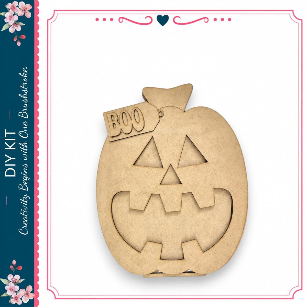 A wooden pumpkin with a carved face and the word "BOO" on it, displayed against a white background.