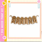 a banner with the word "SPRING" written on it, hanging on a wall.