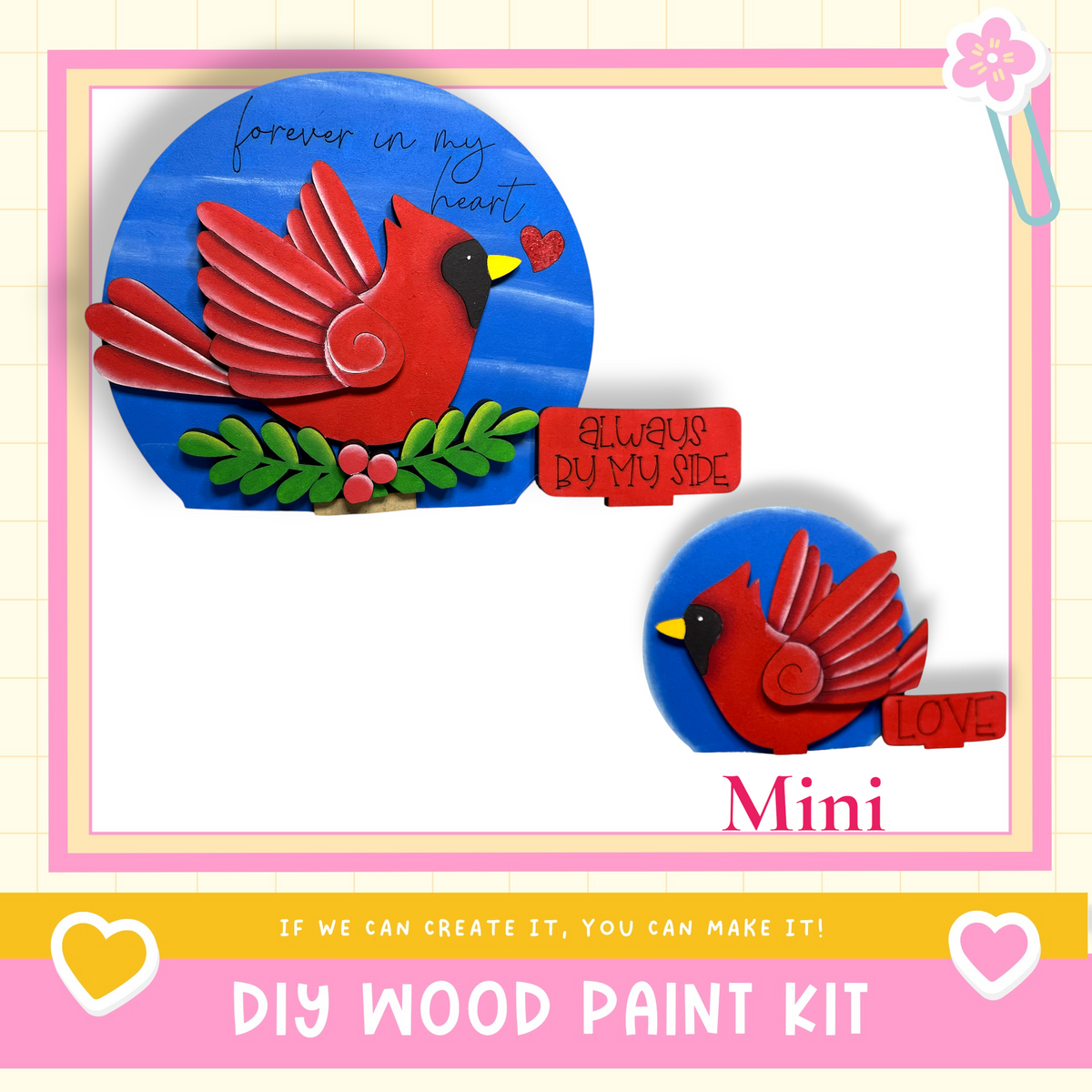 The image is a DIY wood paint kit featuring a red cardinal bird and a smaller red bird, both with wings spread, against a blue background. The kit is designed to allow users to create their own wooden bird decorations.