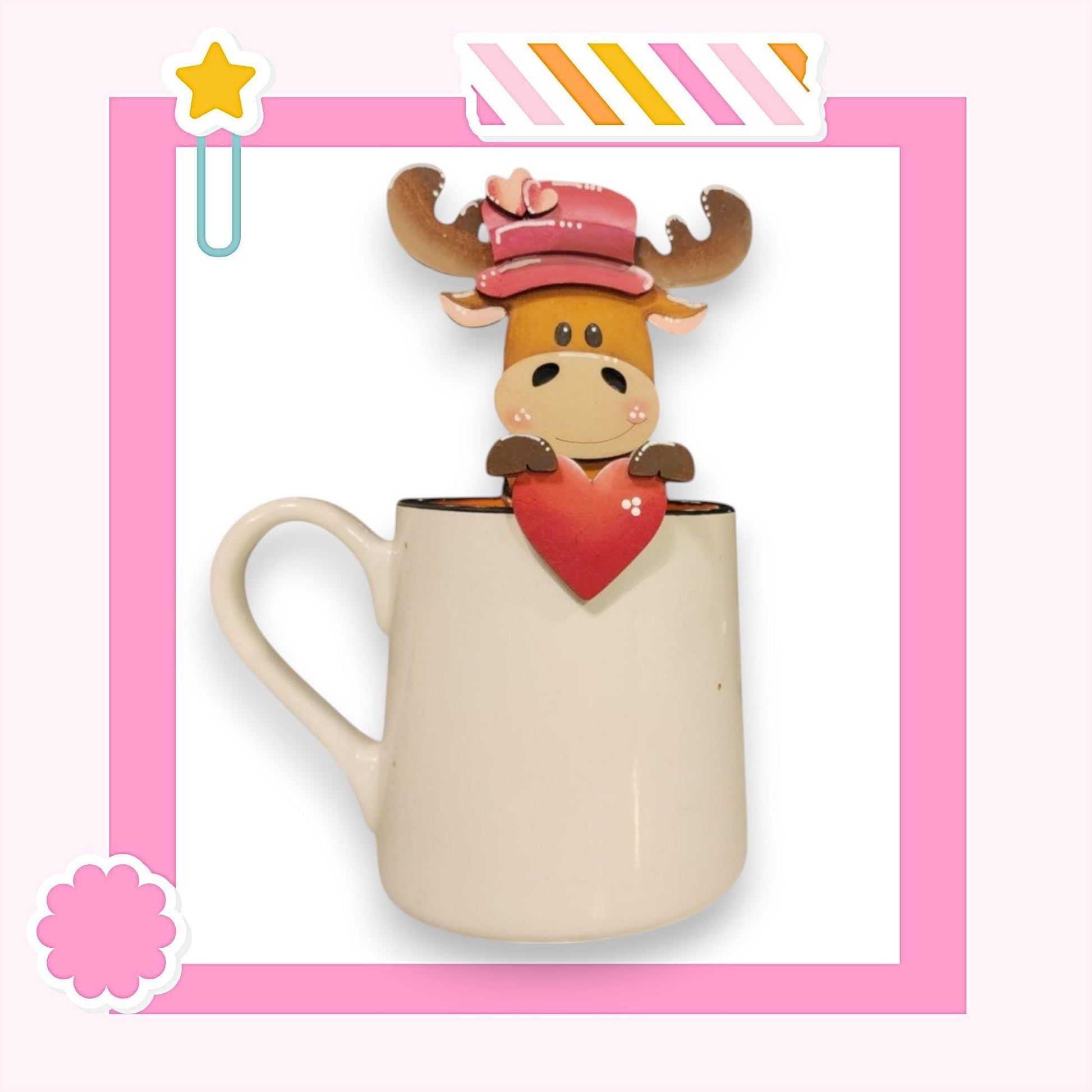 a cow with a heart in a mug