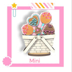 a card with a basket full of cookies