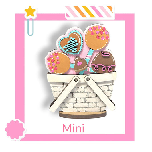 a card with a basket full of cookies