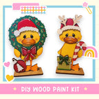 a couple of yellow birds wearing christmas hats