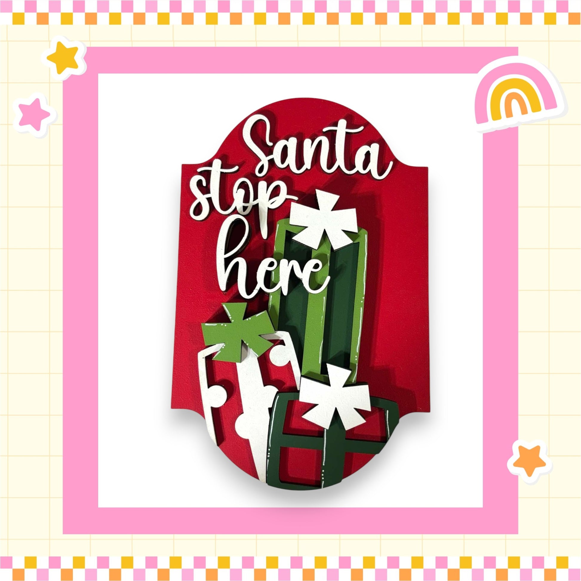 a picture of a santa's stop here sign