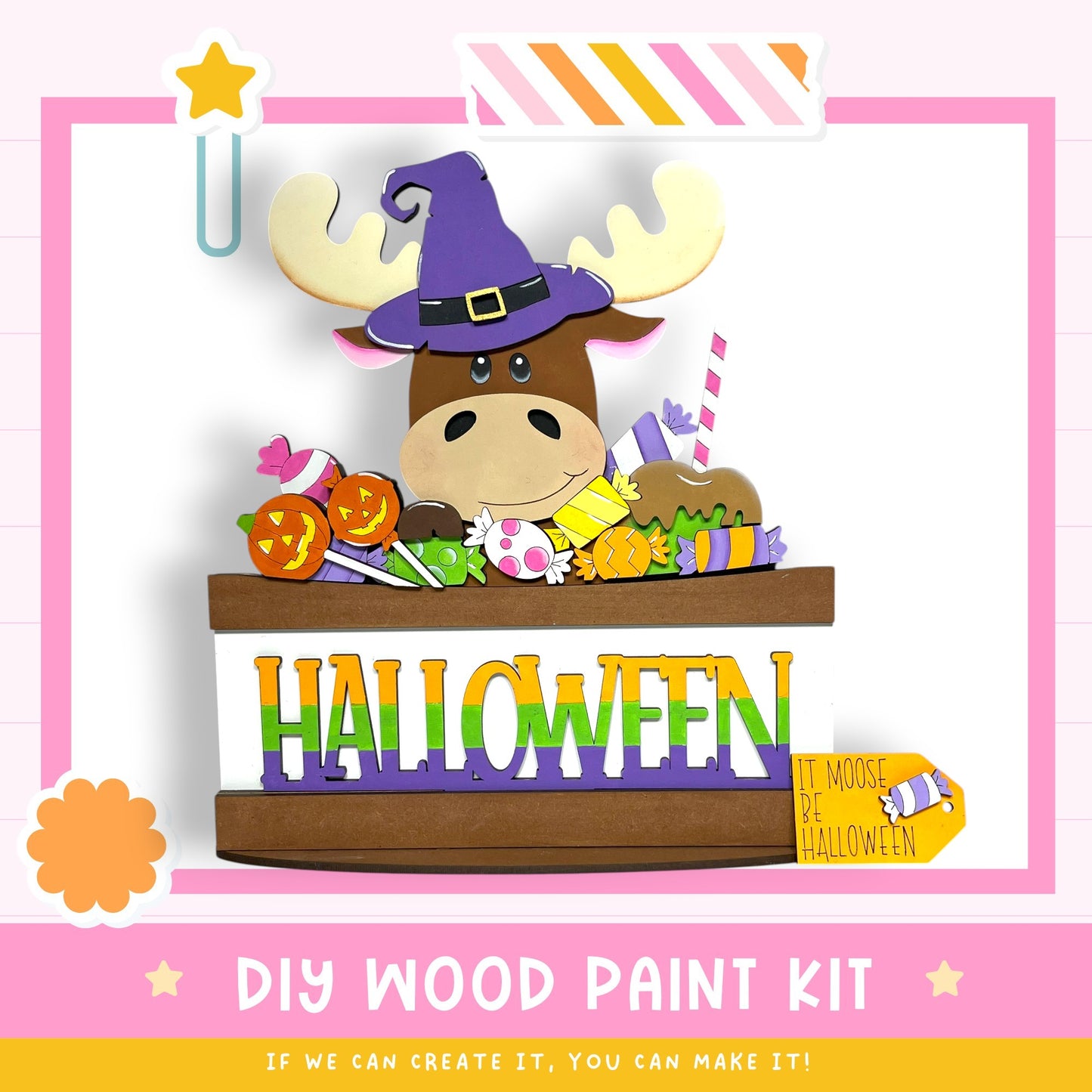 A Halloween-themed DIY wood paint kit featuring a moose wearing a witch's hat and surrounded by various Halloween decorations.