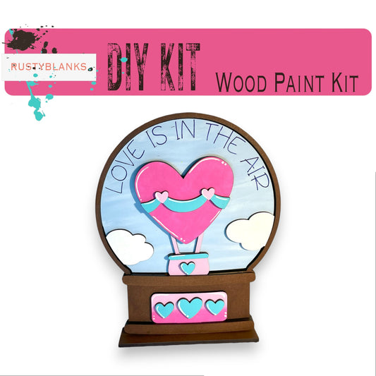 a picture of a wooden craft kit with a picture of a hot air balloon