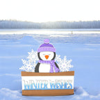 a cardboard box with a snowman in it in the snow