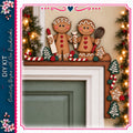 A festive holiday scene featuring two gingerbread men, one holding a rolling pin and the other a whisk, sitting on a mantel decorated with Christmas ornaments and lights.