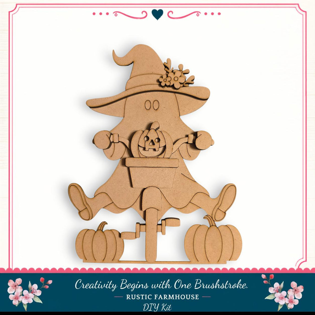 A wooden Halloween-themed figure of a witch riding a bicycle, holding a pumpkin, is displayed against a white background.