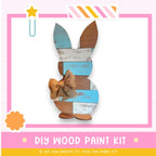 a wooden bunny with a bow on it's head