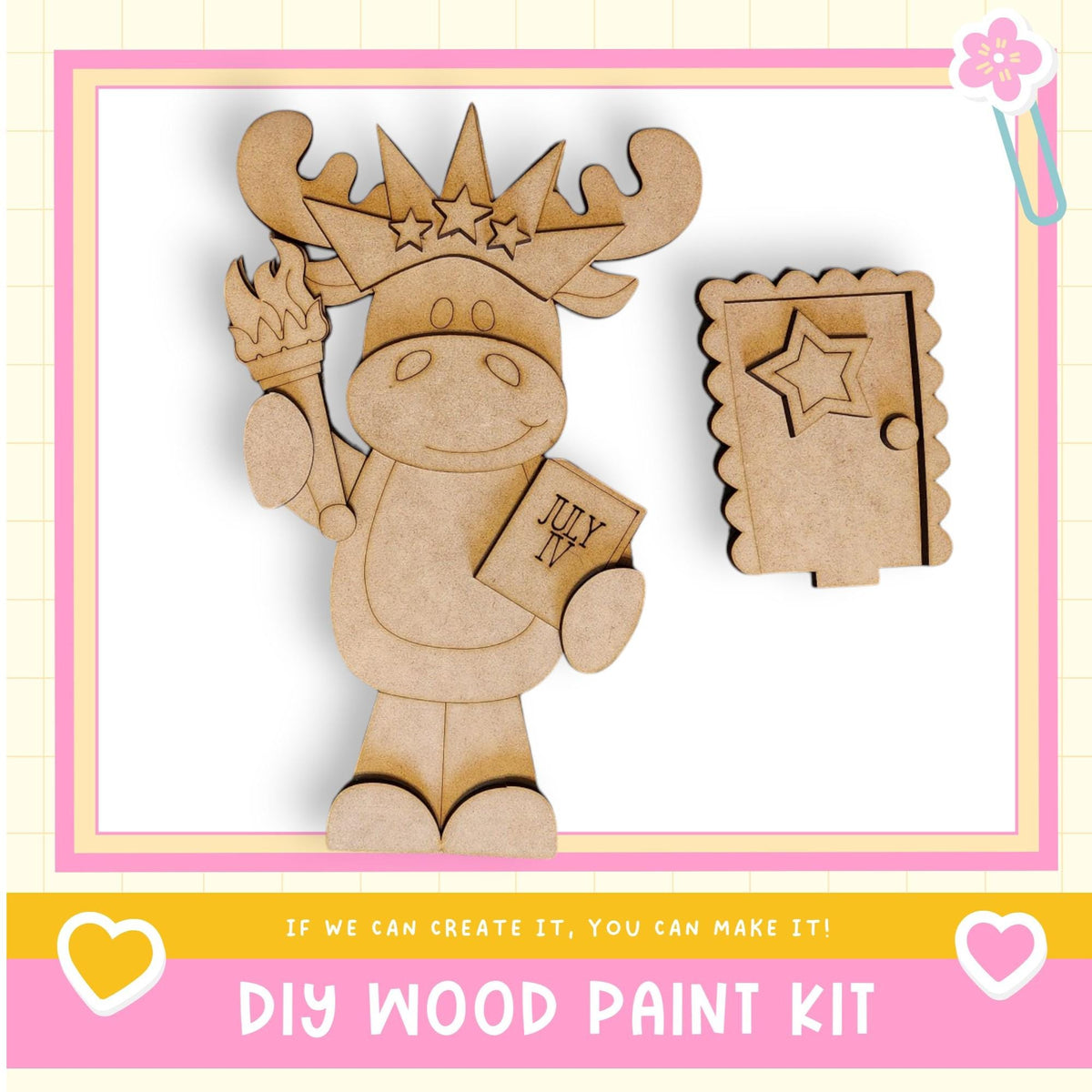 a wooden cutout of a moose holding a sign