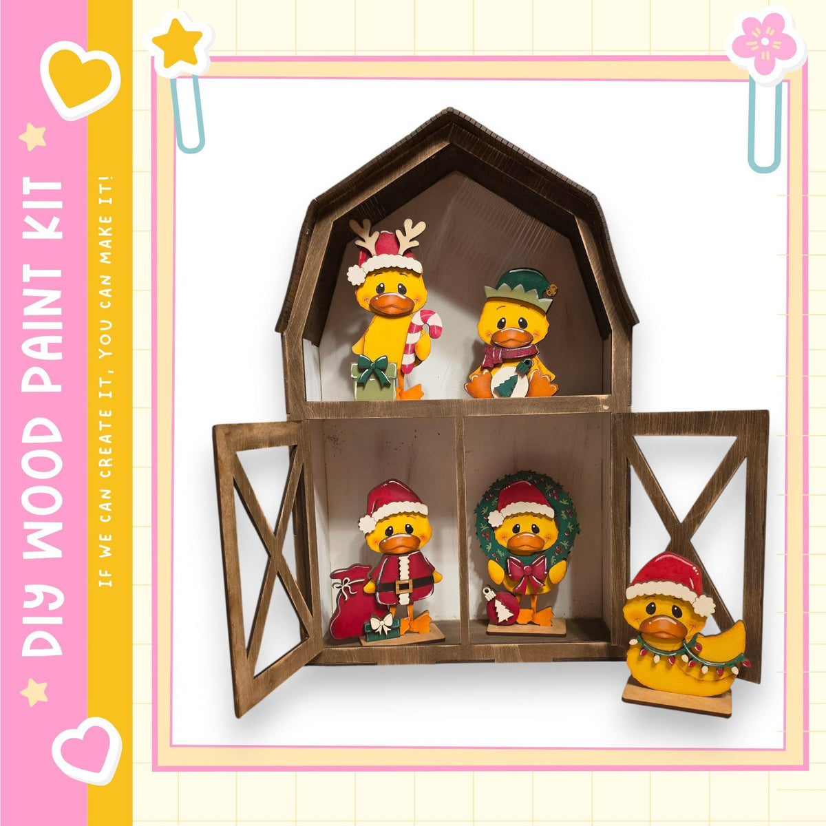 A wooden barn-shaped display case containing various small figurines, including ducks and other animals, dressed in festive holiday attire.