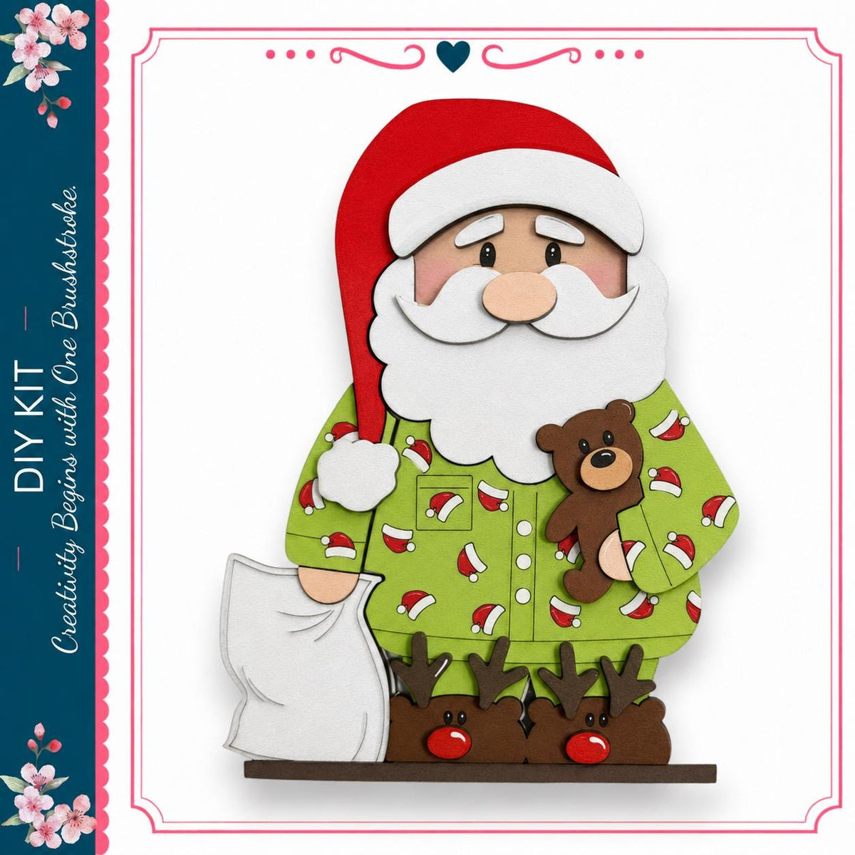 A wooden Santa Claus figure wearing a green pajama suit with red and white patterns, holding a teddy bear, and standing on reindeer feet.