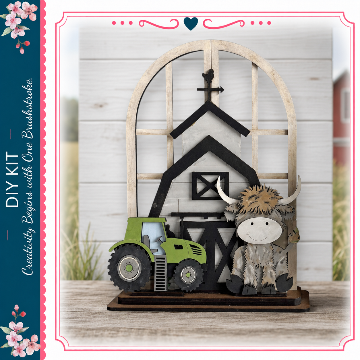 a wooden barn and a green tractor, both of which are part of a creative DIY project.
