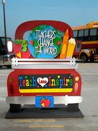 a red school bus parked in a parking lot