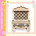 a wooden cabinet with a lattice design on the front.