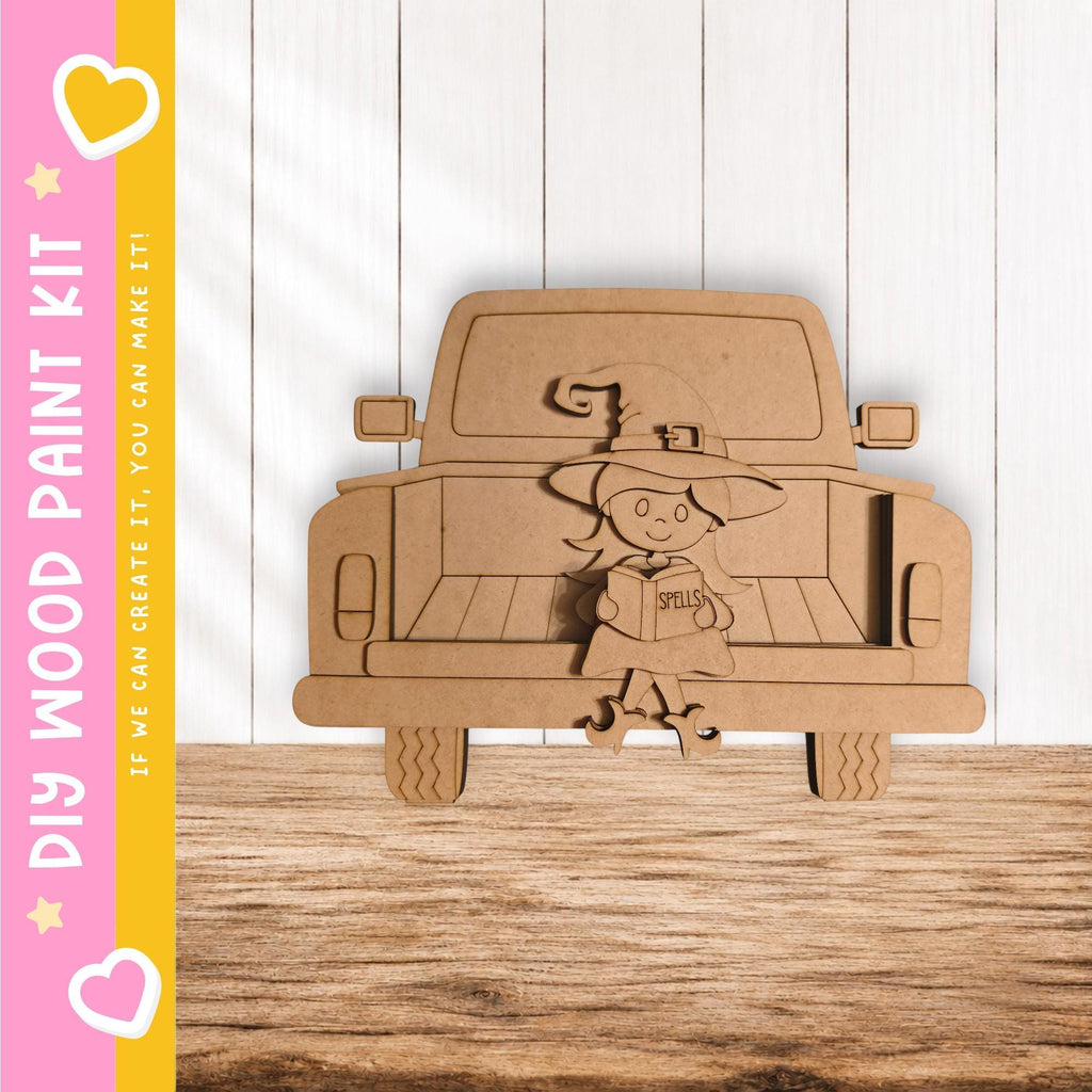 A wooden craft kit depicting a cartoon character in a truck bed, with a pink and yellow striped border.