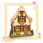 a small wooden house with windows and shutters