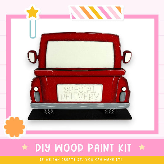 a red truck with a white sign that says "Special Delivery" on the back. The truck is displayed against a pink background with a white border.