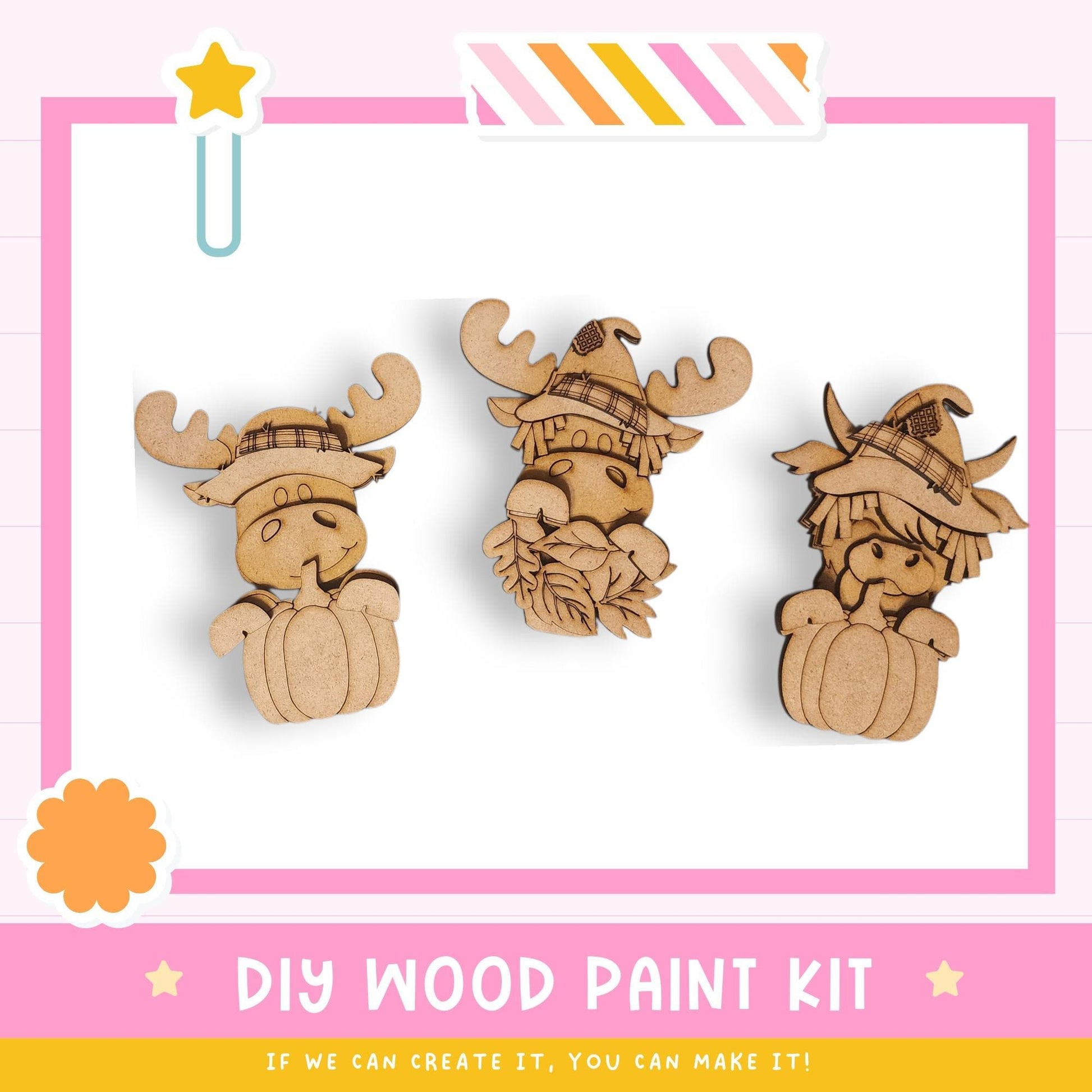 three wooden animal figurines, including a moose, a deer, and a bear, each wearing a hat and a pumpkin. The image is a DIY wood paint kit, and the caption encourages viewers to create their own wooden designs.
