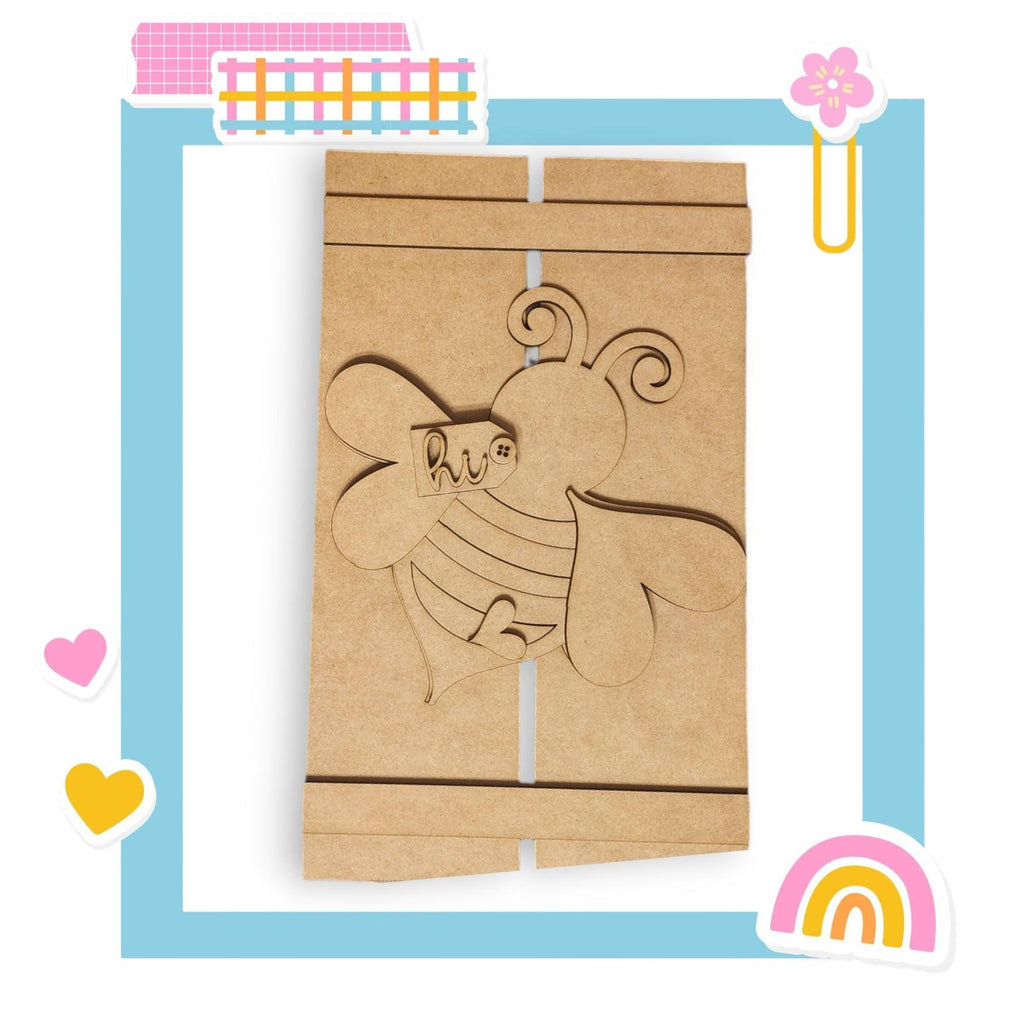 a piece of cardboard with a picture of a mouse and a mouse on it