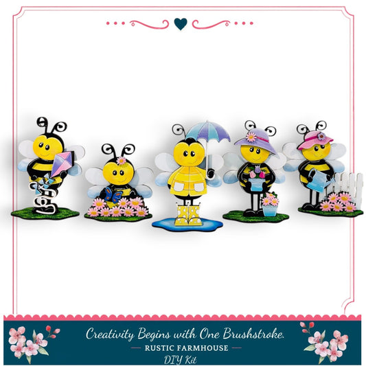 A group of five colorful, whimsical bee figurines arranged in a row, each with unique accessories such as umbrellas and flowers.